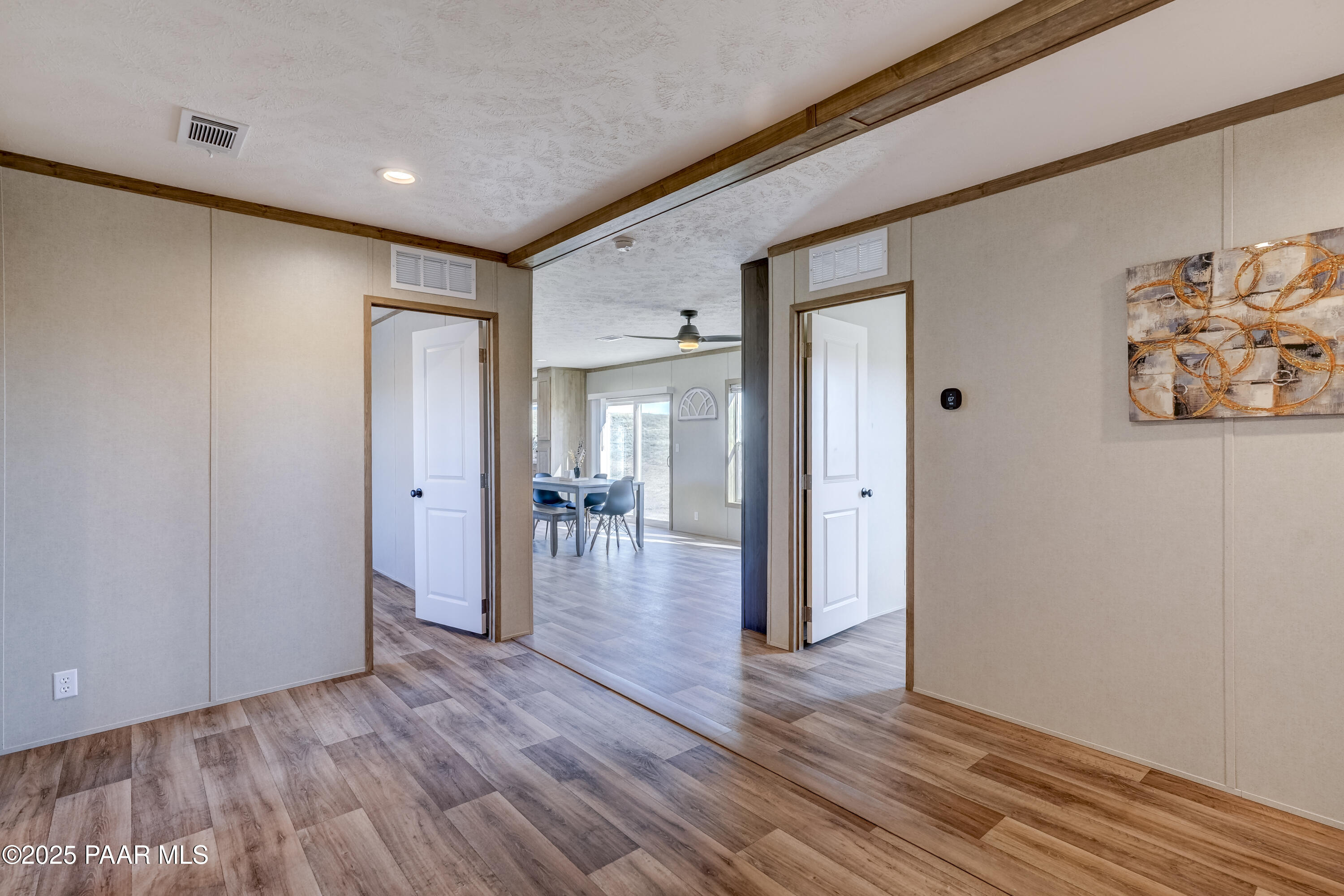 26987 North Chicory Way Paulden, AZ 86334 - Photo 18 of 44 a view of a hallway with wooden floor