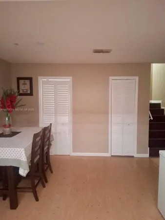 a workspace with furniture and a window