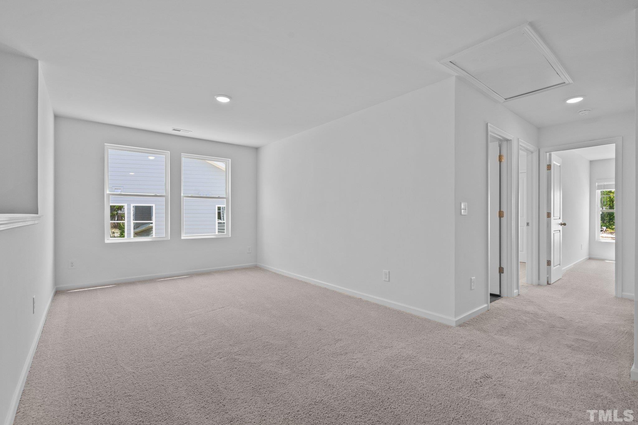 309 Spaight Acrs Way Wake Forest, NC 27587 - Photo 13 of 41 a view of empty room with windows