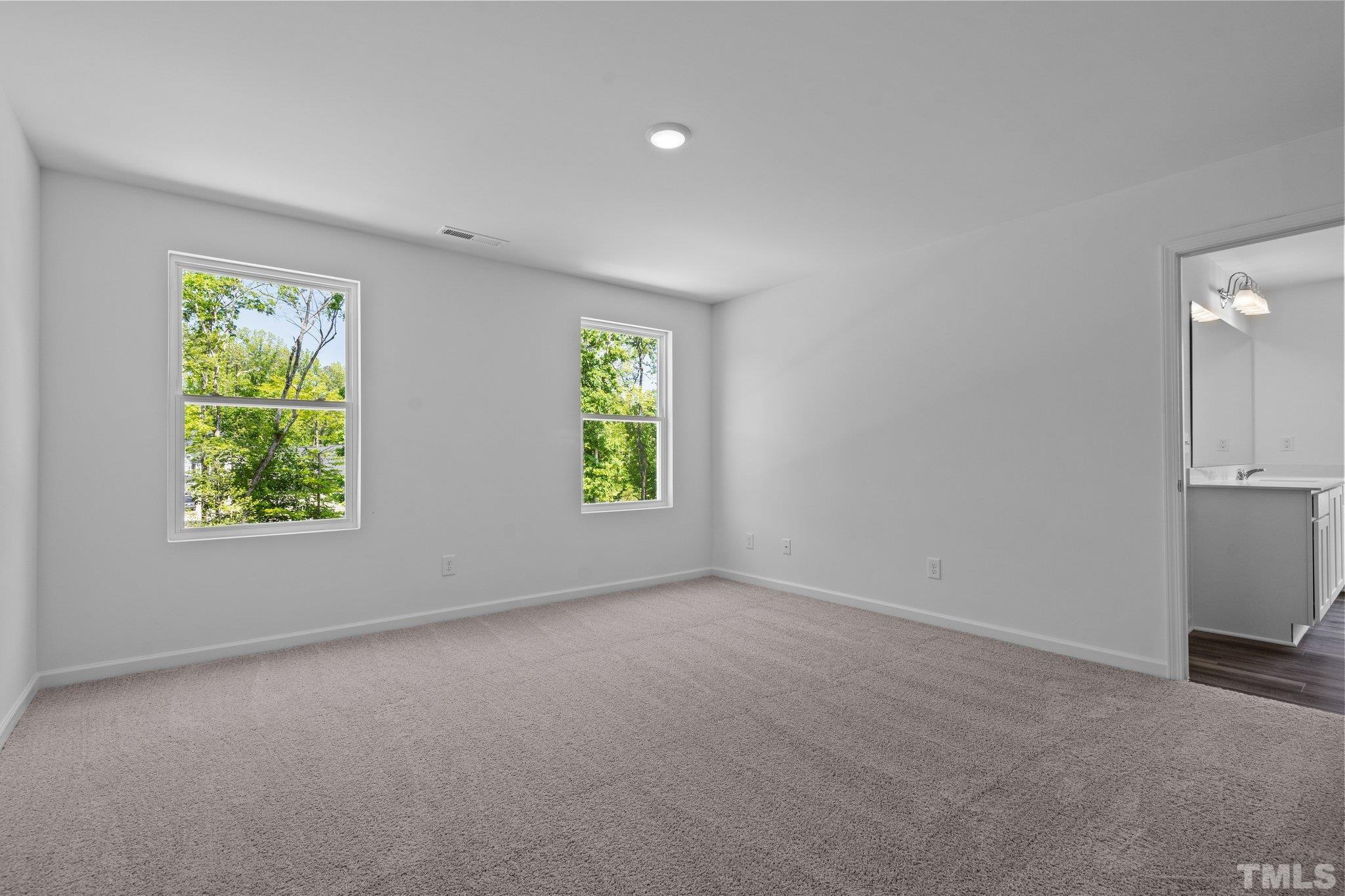 309 Spaight Acrs Way Wake Forest, NC 27587 - Photo 15 of 41 an empty room with windows