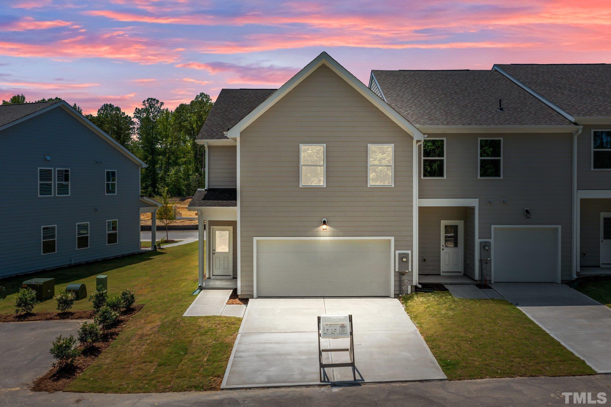 309 Spaight Acrs Way Wake Forest, NC 27587 - Photo 2 of 41 a view of a back yard of the house