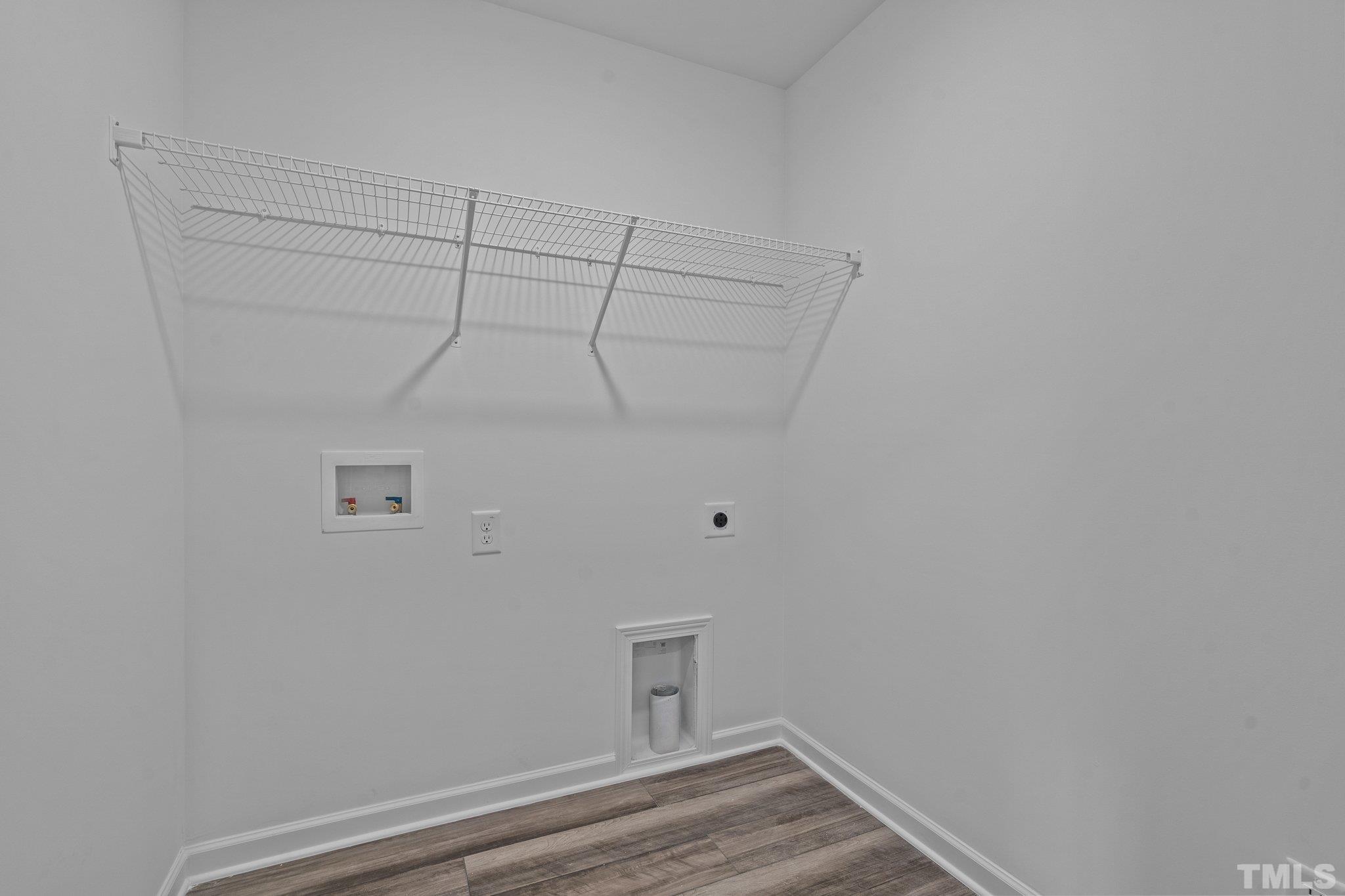 309 Spaight Acrs Way Wake Forest, NC 27587 - Photo 22 of 41 a view of an empty walk in closet