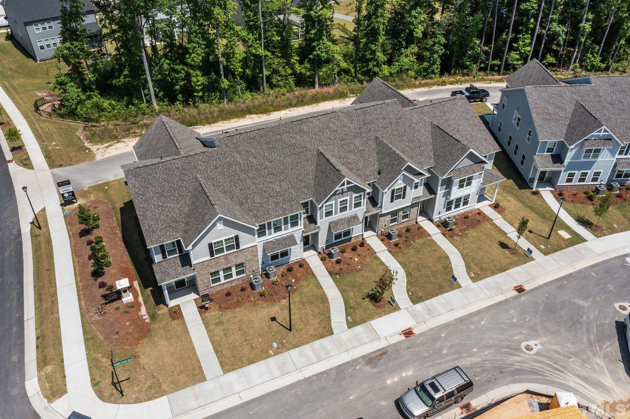 309 Spaight Acrs Way Wake Forest, NC 27587 - Photo 29 of 41 an aerial view of a house with a swimming pool