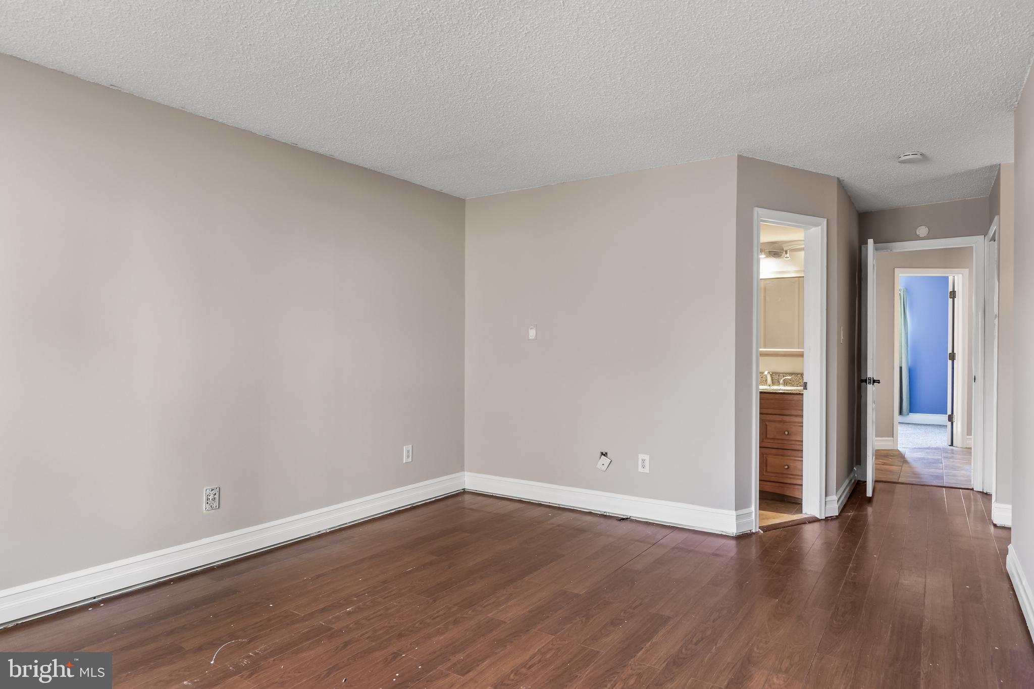 511 Chanticleer Cherry Hill, NJ 08003 - Photo 17 of 24 a view of an empty room with wooden floor and closet