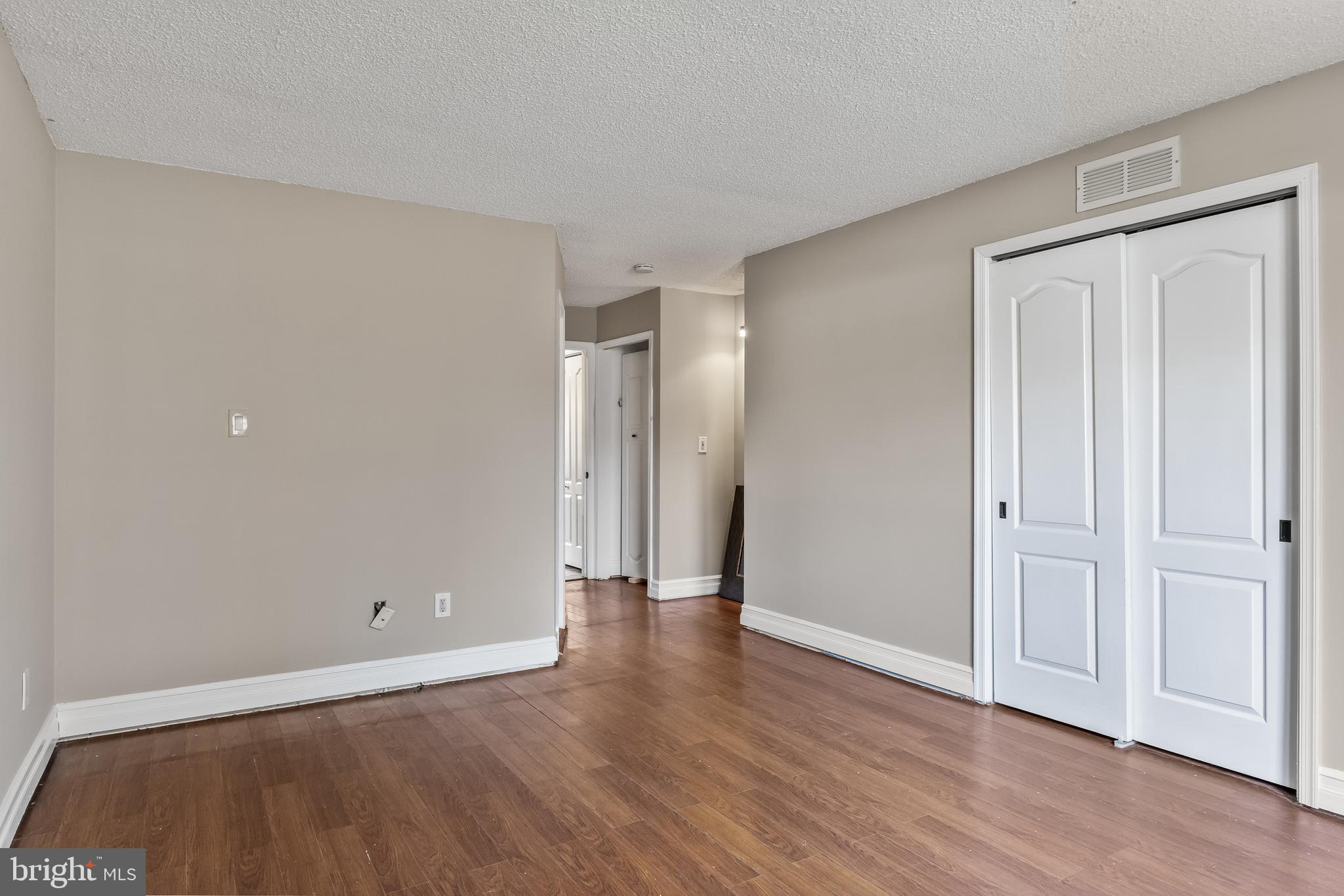 511 Chanticleer Cherry Hill, NJ 08003 - Photo 18 of 24 a view of an empty room with wooden floor