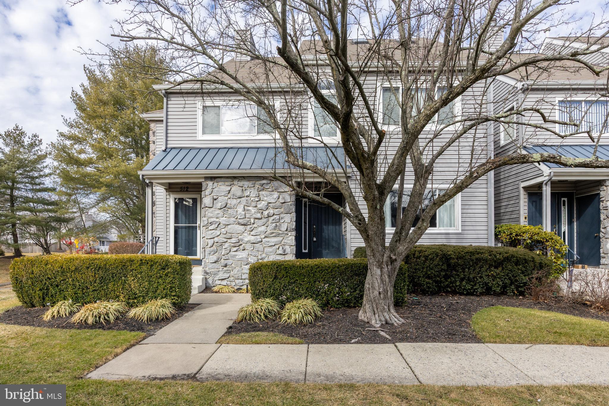 511 Chanticleer Cherry Hill, NJ 08003 - Photo 2 of 24 a front view of a house with garden