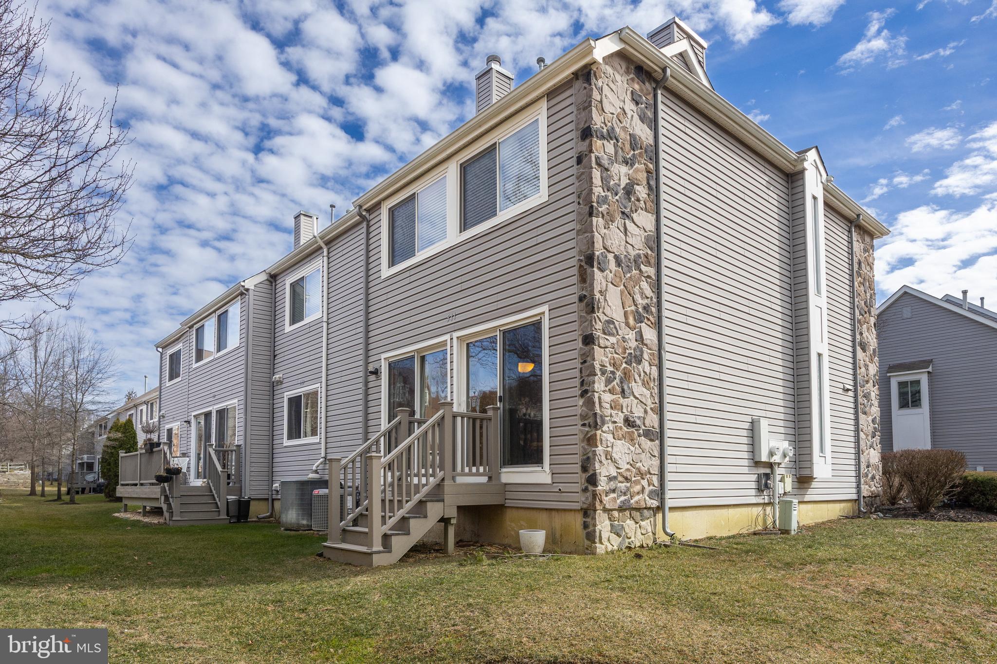 511 Chanticleer Cherry Hill, NJ 08003 - Photo 23 of 24 a front view of a house with a yard