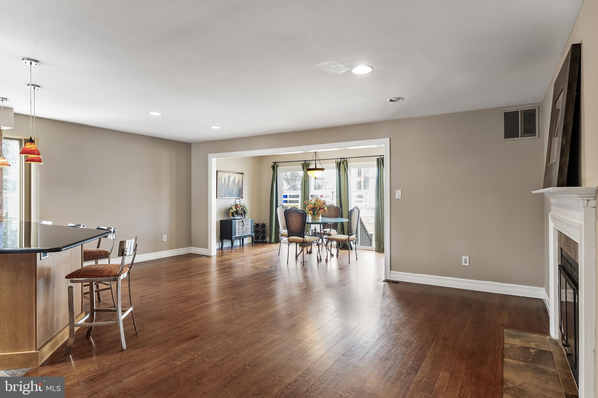 511 Chanticleer Cherry Hill, NJ 08003 - Photo 4 of 24 a view of a livingroom with furniture a table and wooden floor