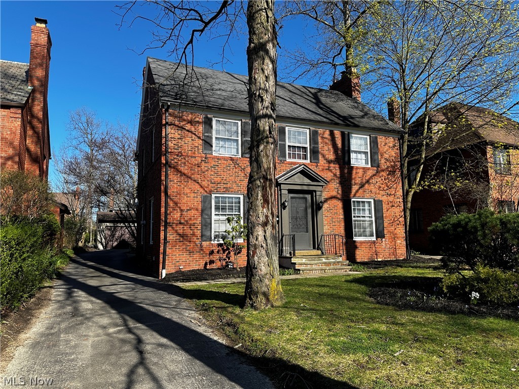 2447 Dysart Road Cleveland, OH 44118 - Photo 1 of 20 Colonial-style house with a front lawn