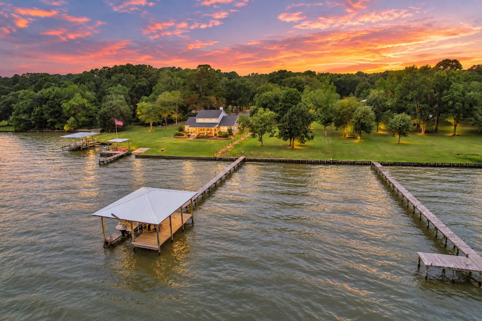 Tbd Johnson Road Coldspring, TX 77331 - Photo 1 of 27 LAKEFRONT LIVING AT ITS FINEST! Discover your own slice of paradise with 1.7 gorgeous UNRESTRICTED acres, breathtaking waterfront views & a private boathouse ready for endless days on the water! Enjoy expansive green lawns, mature trees & incredible space to relax, entertain or create your dream lakeside retreat. Whether you're boating, fishing or soaking in the sunset, this stunning property delivers the ultimate lakefront lifestyle!