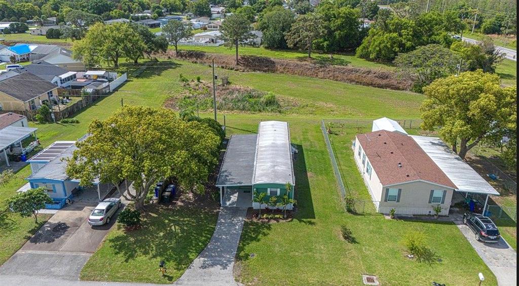 2009 Pine Street St. Cloud, FL 34769 - Photo 15 of 17 an aerial view of a house with garden space and street view