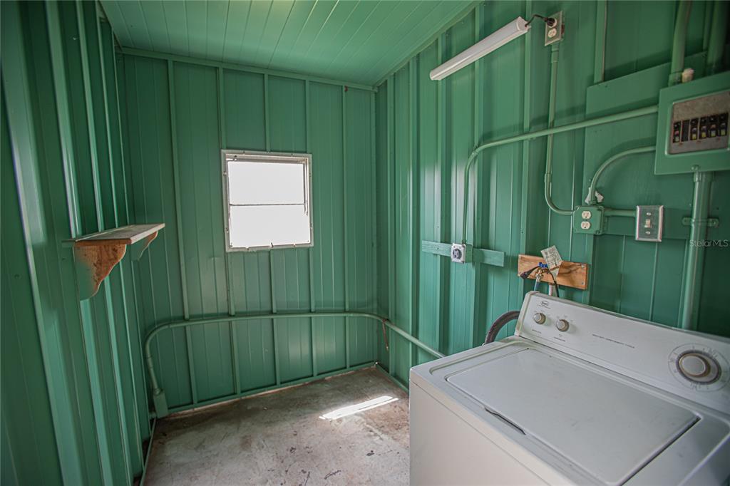 2009 Pine Street St. Cloud, FL 34769 - Photo 16 of 17 a bathroom with a sink and toilet