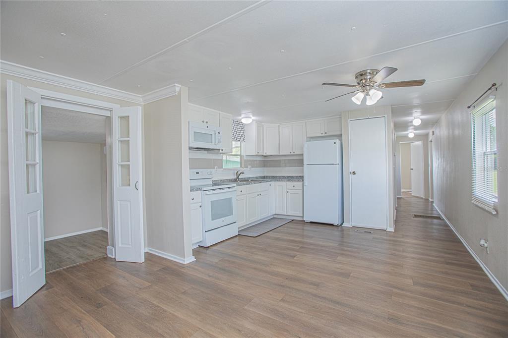 2009 Pine Street St. Cloud, FL 34769 - Photo 3 of 17 a view of a kitchen with a sink and a window