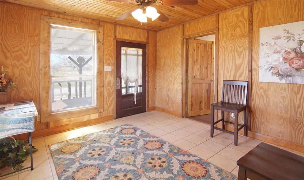 504 Doe Lane Graham, TX 76450 - Photo 16 of 27 a spacious bedroom with a bed and a window