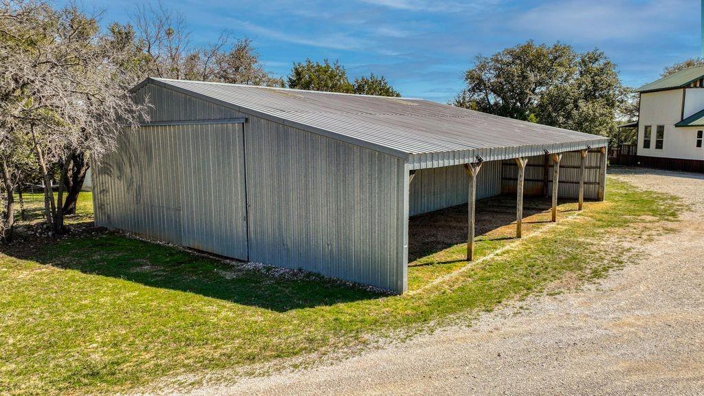 504 Doe Lane Graham, TX 76450 - Photo 19 of 27 a backyard of a house