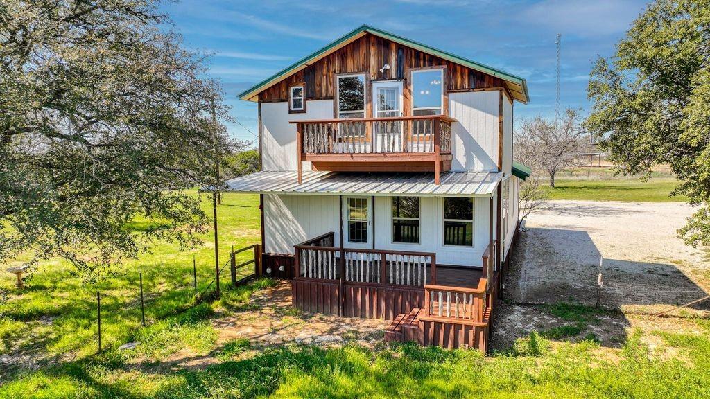 504 Doe Lane Graham, TX 76450 - Photo 2 of 27 a view of house with a yard and sitting area