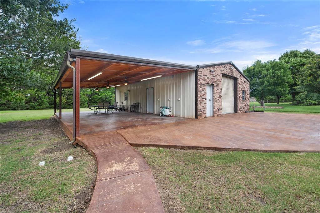 413 Rugged Drive Red Oak, TX 75154 - Photo 2 of 39 1200 sq. ft workshop