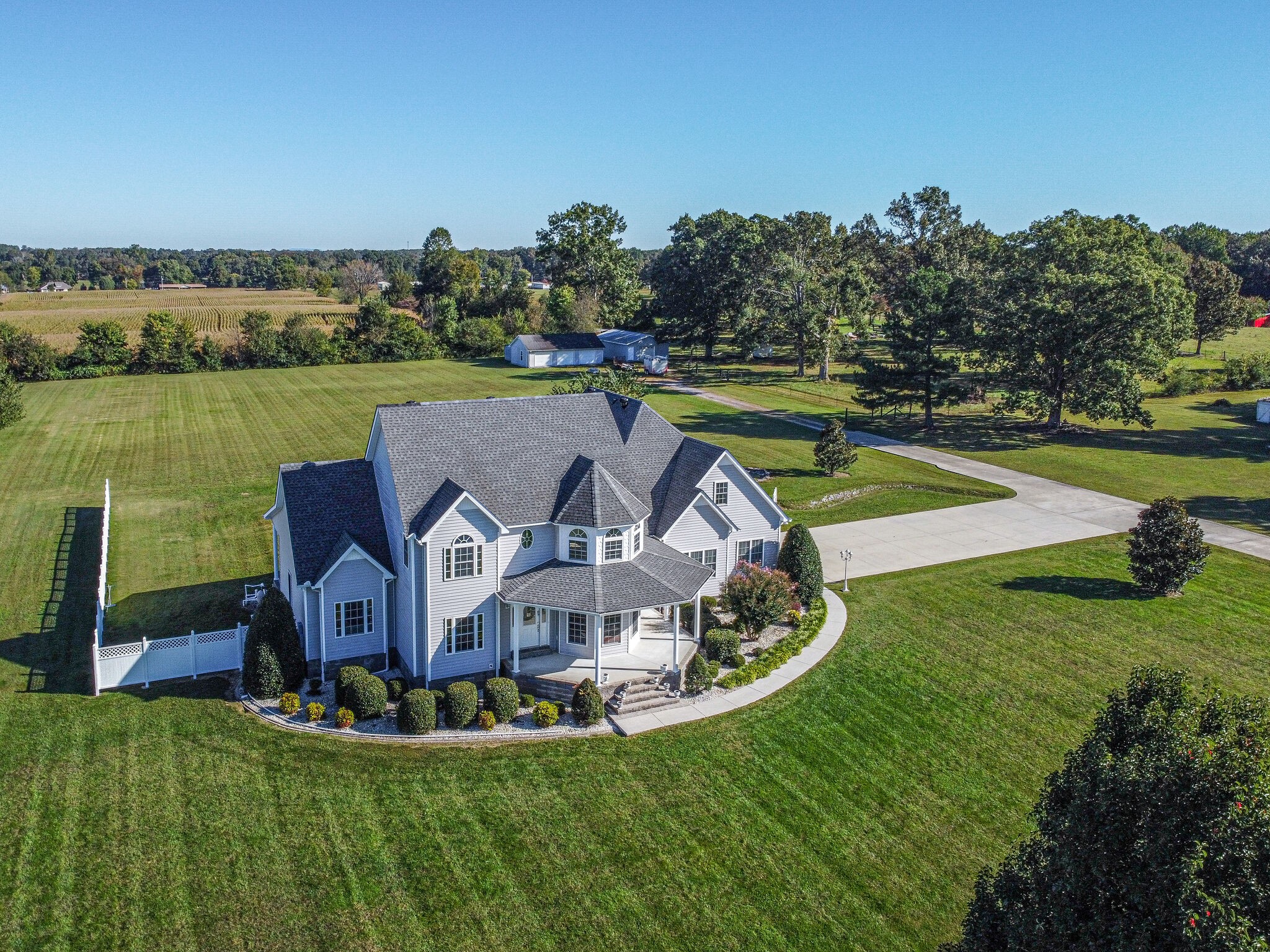 163 Harper Road Manchester, TN 37355 - Photo 2 of 43 a view of a house with a yard and sitting area