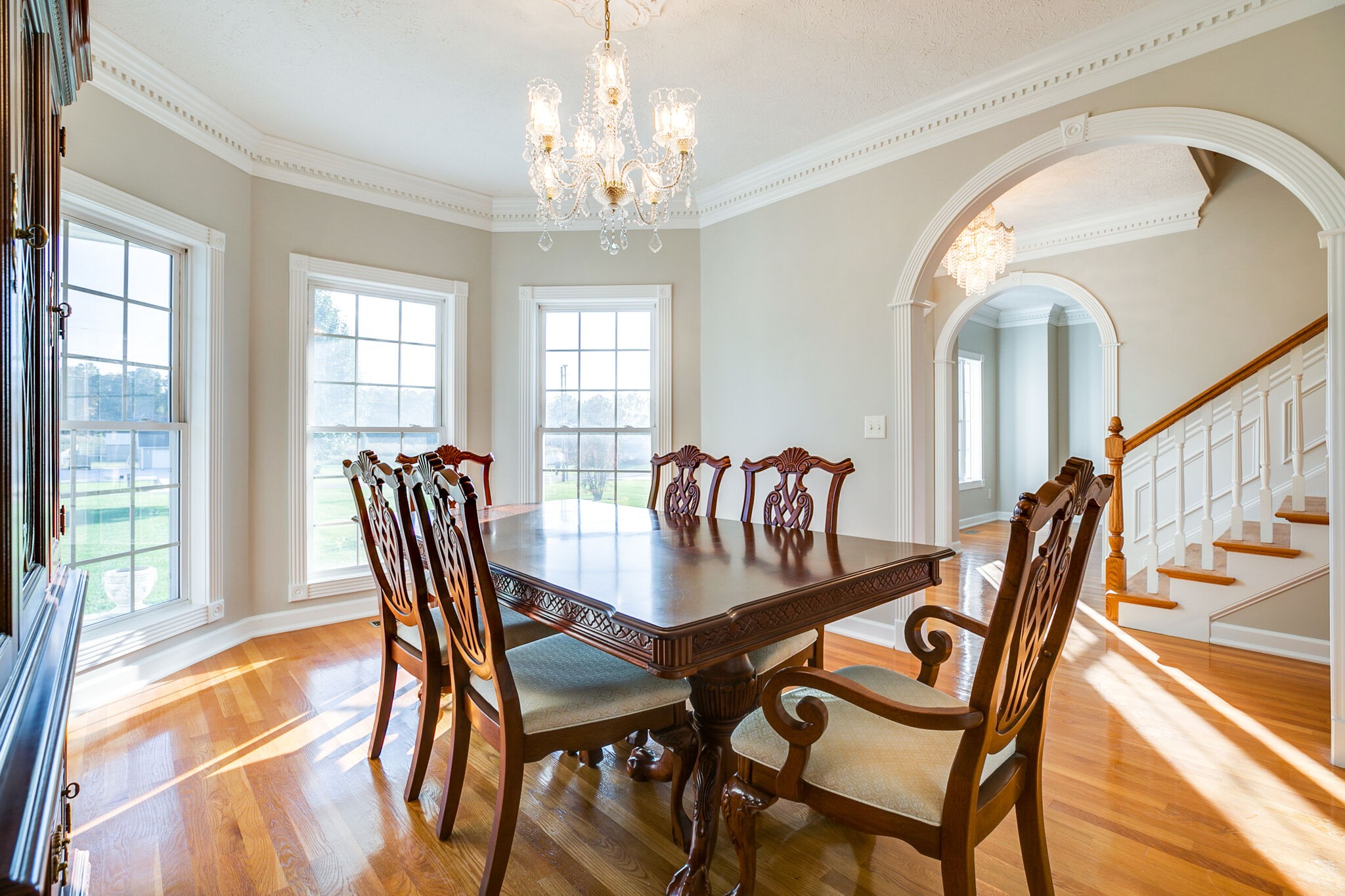 163 Harper Road Manchester, TN 37355 - Photo 14 of 43 a view of a dining room with furniture a chandelier and wooden floor