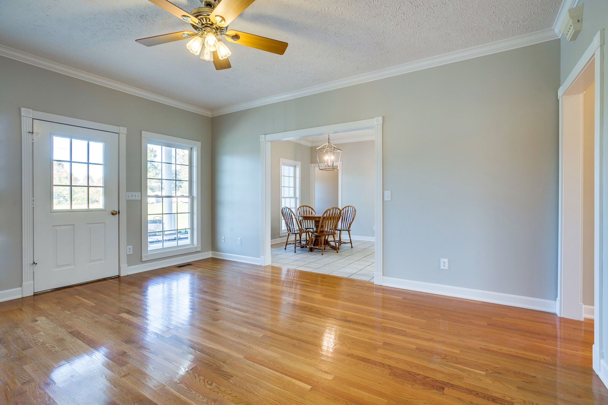 163 Harper Road Manchester, TN 37355 - Photo 20 of 43 a view of a livingroom with a furniture wooden floor and chandelier