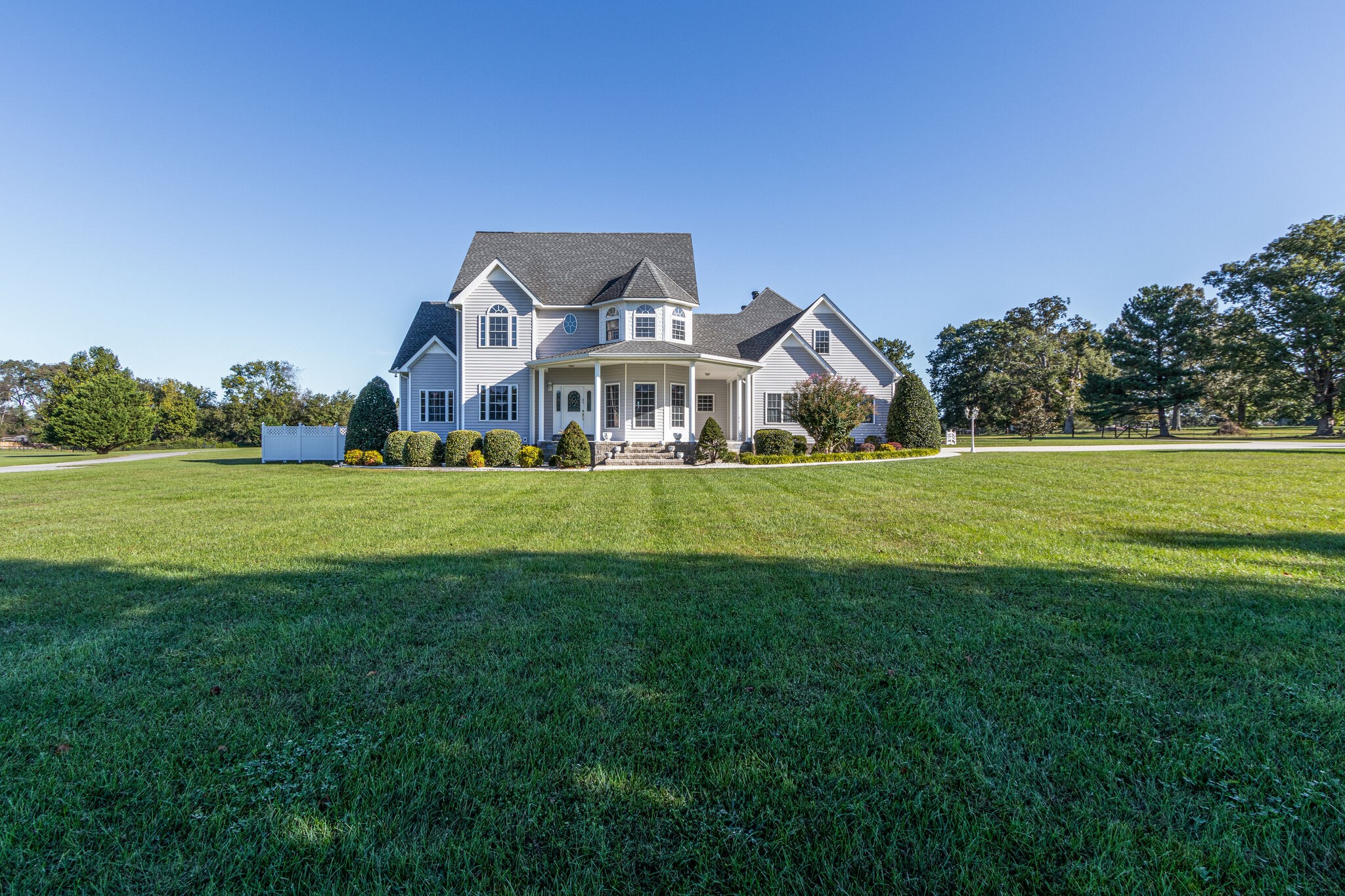 163 Harper Road Manchester, TN 37355 - Photo 3 of 43 a front view of a house with a yard