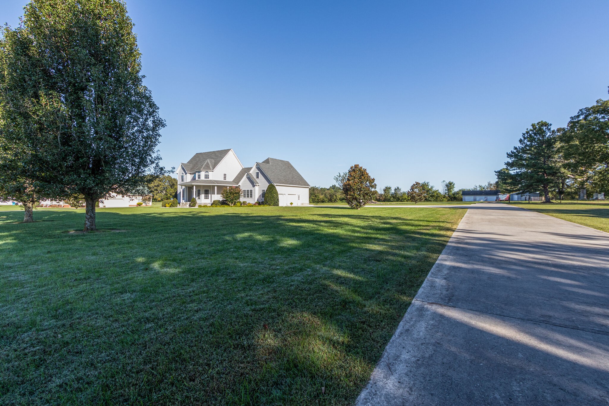 163 Harper Road Manchester, TN 37355 - Photo 4 of 43 a view of a park with large trees