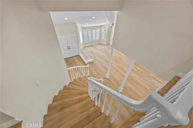 a view of entryway with wooden floor