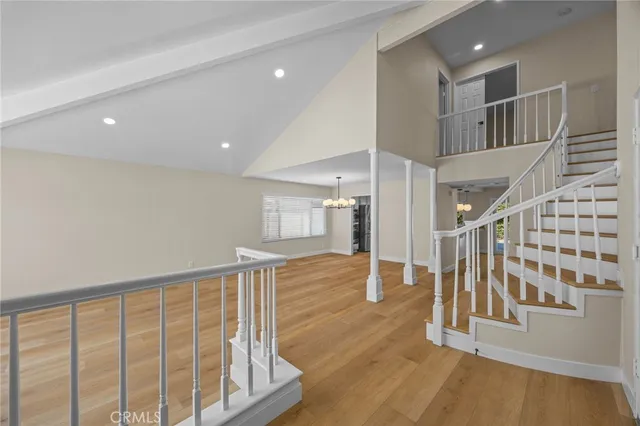 a view of entryway with wooden floor