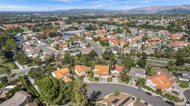 an aerial view of a city with lots of residential buildings