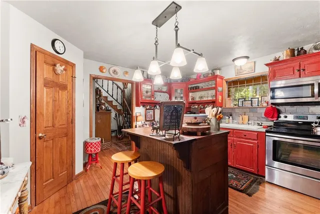 a view of a kitchen and dining area