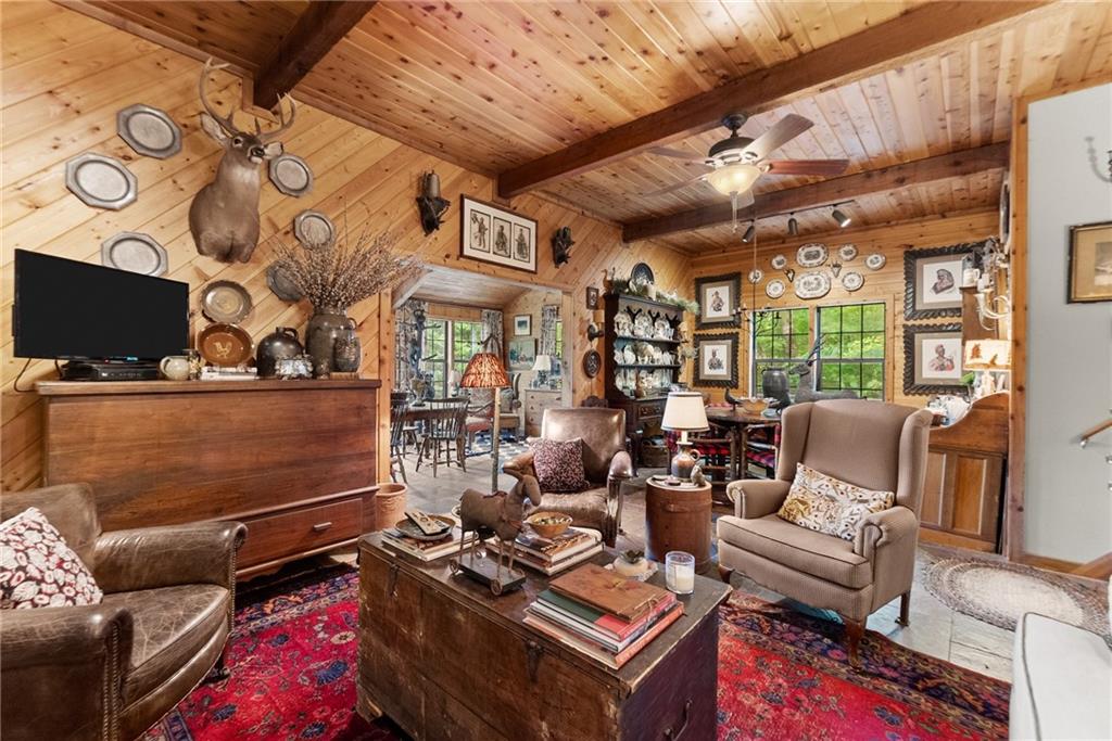 62 High Ridge Road Cleveland, GA 30528 - Photo 21 of 55 a living room with furniture and a flat screen tv