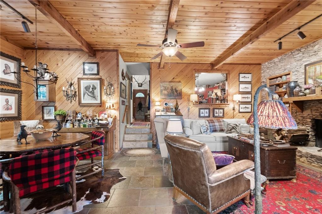 62 High Ridge Road Cleveland, GA 30528 - Photo 25 of 55 a living room with furniture and a flat screen tv