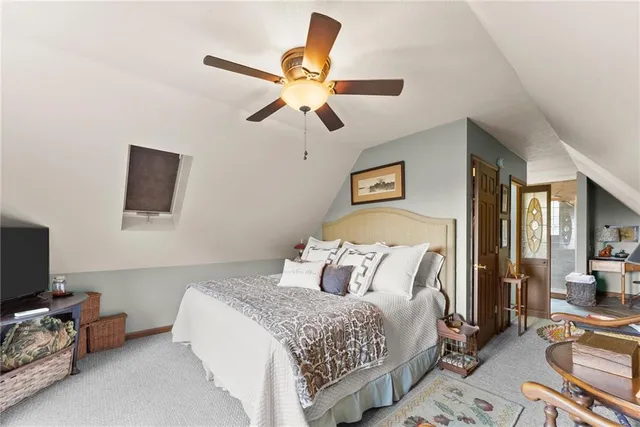 a room with furniture and a mirror