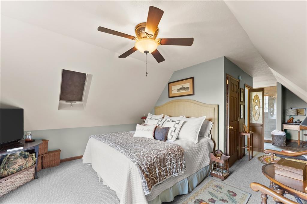 62 High Ridge Road Cleveland, GA 30528 - Photo 30 of 55 a bedroom with a bed and a flat screen tv