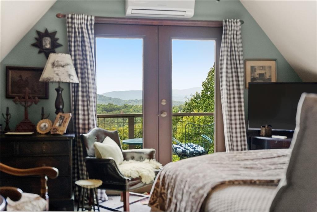 62 High Ridge Road Cleveland, GA 30528 - Photo 3 of 55 a bedroom with furniture and a window