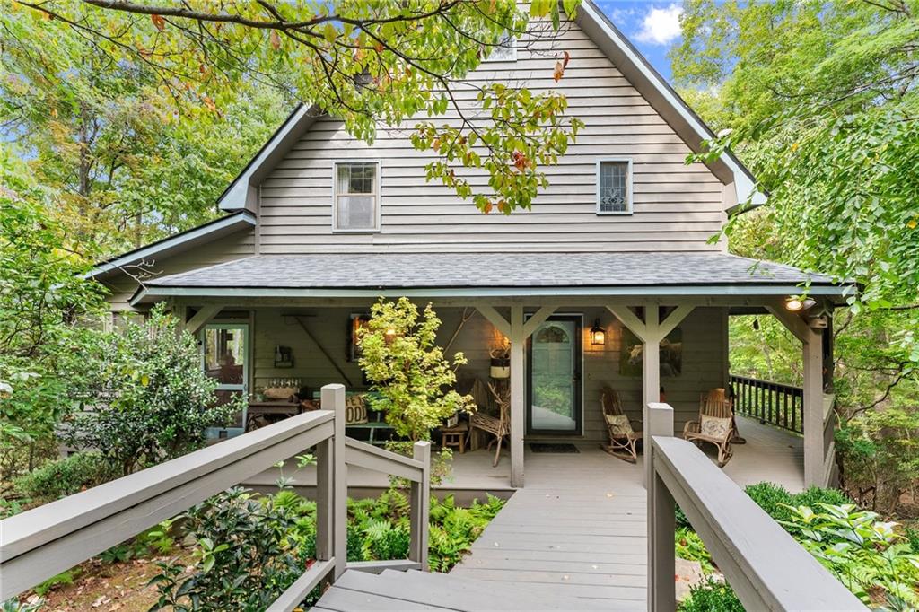 62 High Ridge Road Cleveland, GA 30528 - Photo 7 of 55 a view of a house with porch and garden
