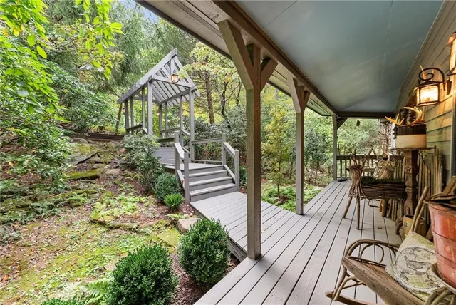 a view of balcony with trees