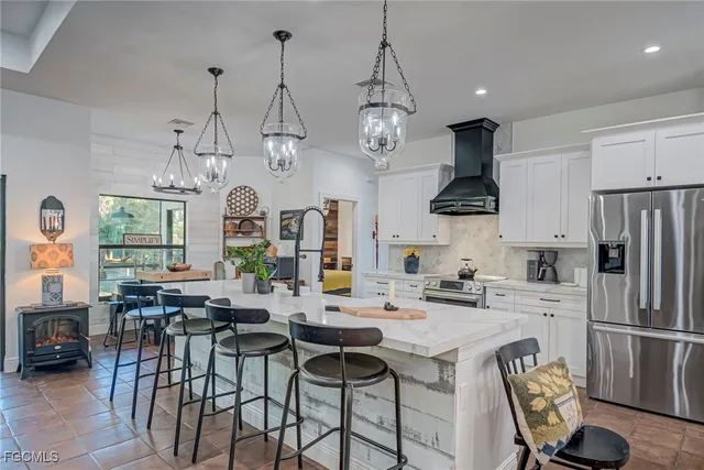 $575,000 | 3985 38th Avenue Southeast, Naples, FL 34117