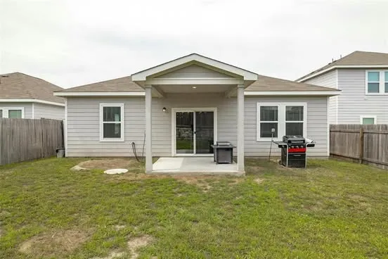 a view of a house with swimming pool and porch