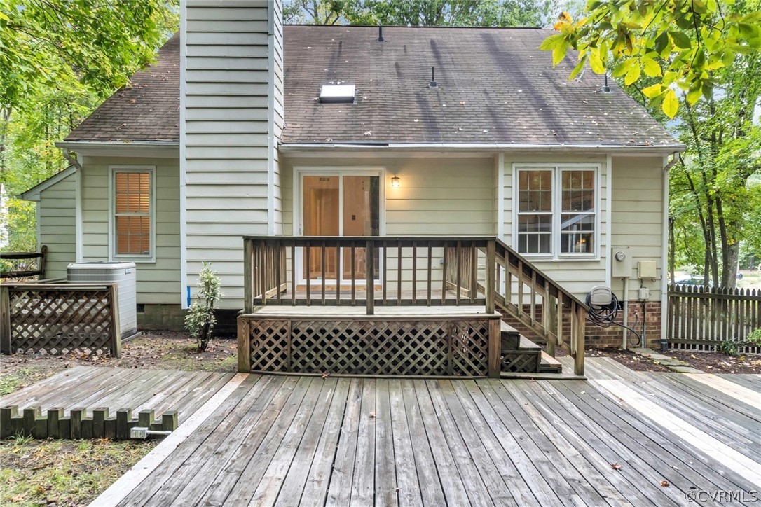 5824 Mill Spring Road Midlothian, VA 23112 - Photo 27 of 29 a view of a wooden deck with furniture