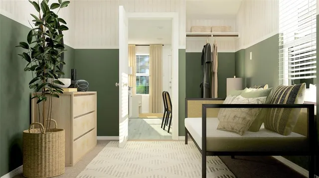 a balcony view with couple of chairs and potted plant