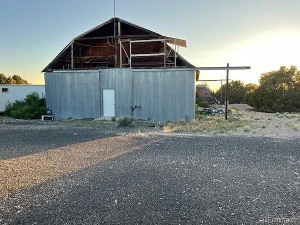 a wooden door with a outdoor space