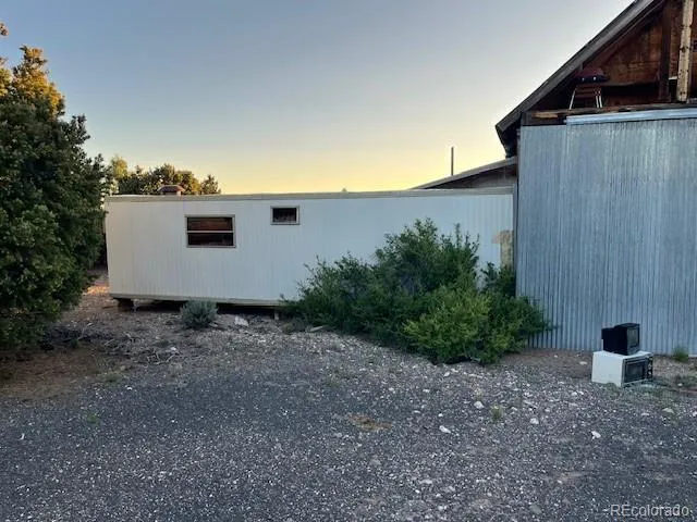 a view of a backyard with plants