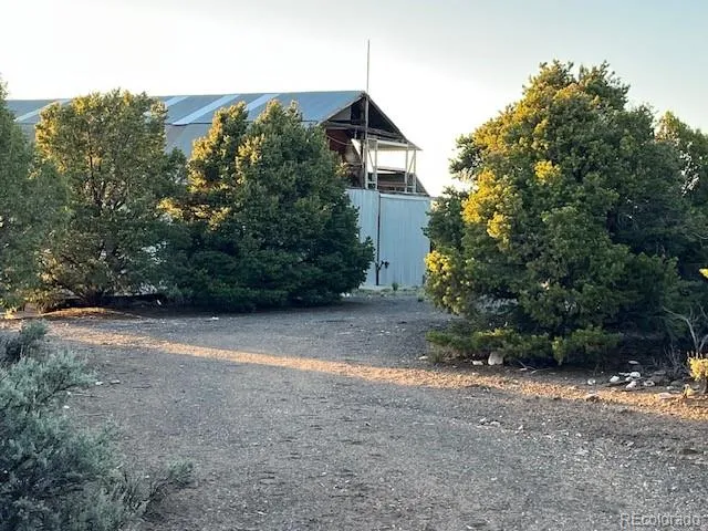 a view of a house with a street