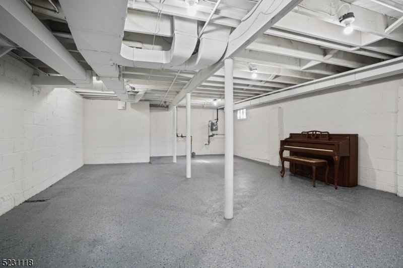 11 North Derby Road Springfield, NJ 07081 - Photo 14 of 30 a view of a garage with furniture