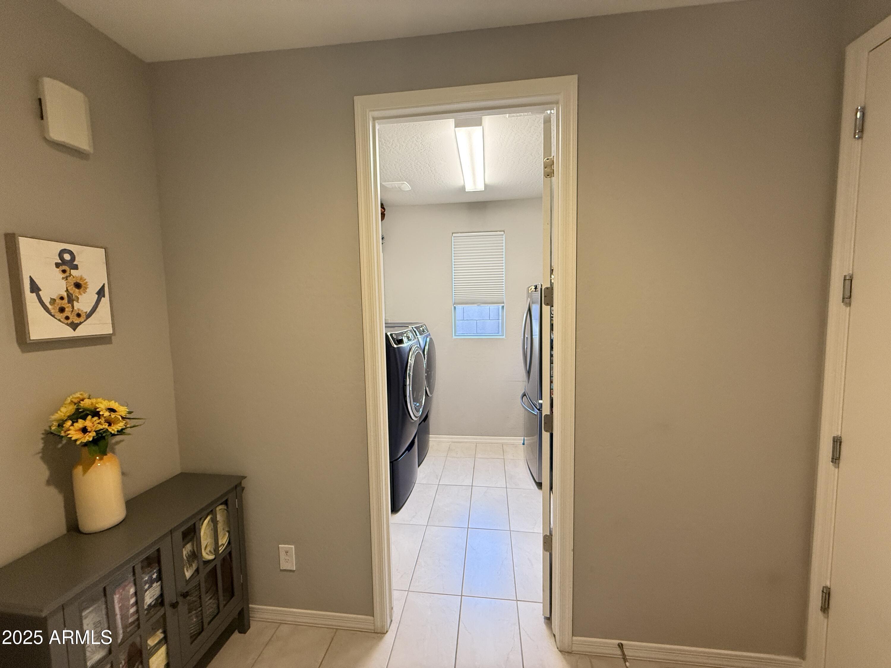 6980 West Redbird Road Peoria, AZ 85383 - Photo 27 of 31 a bathroom with a shower