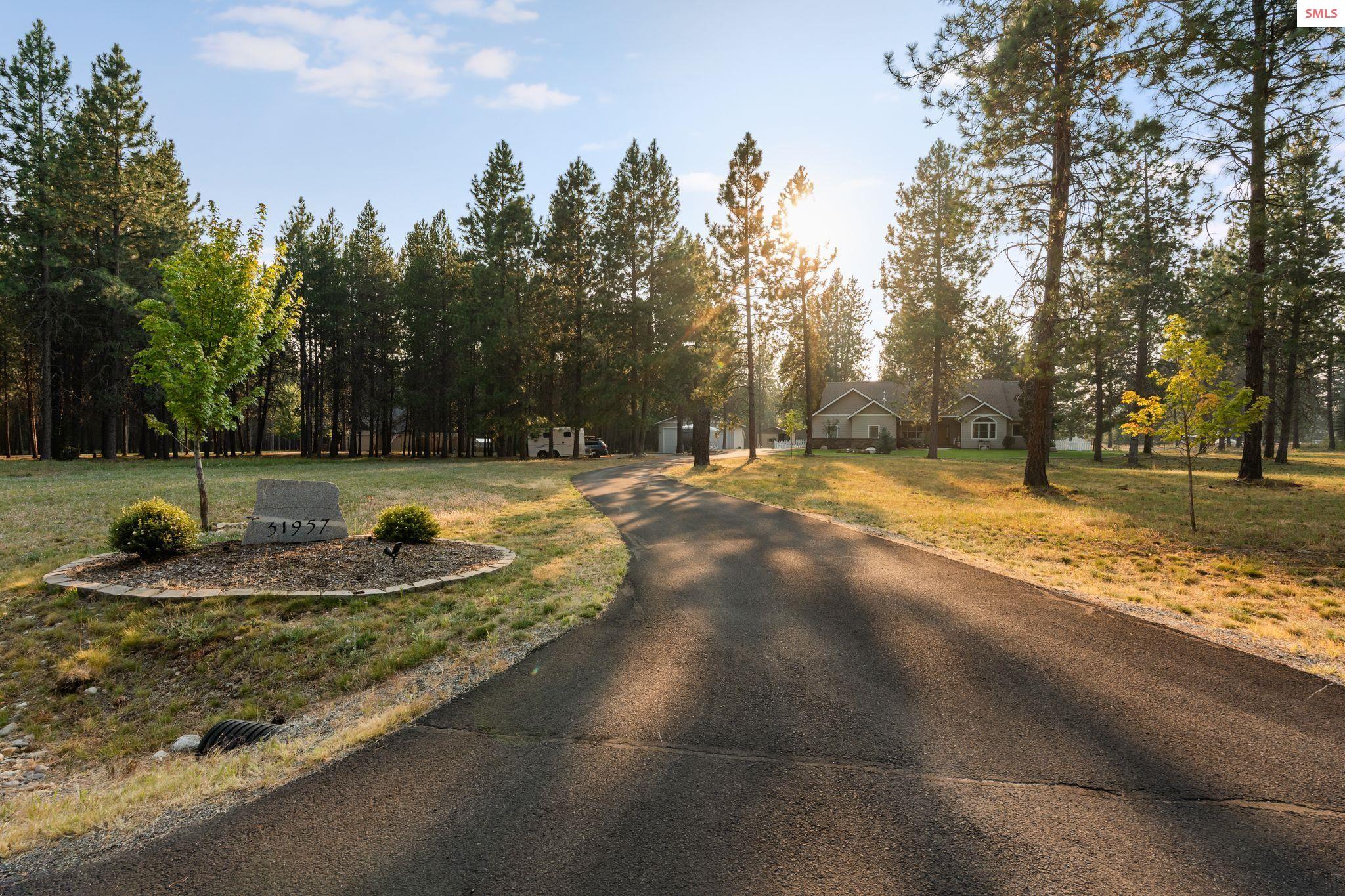 31957 North Wester Ranch Road Athol, ID 83801 - Photo 58 of 66 Asphalt driveway and stunning entrance!
