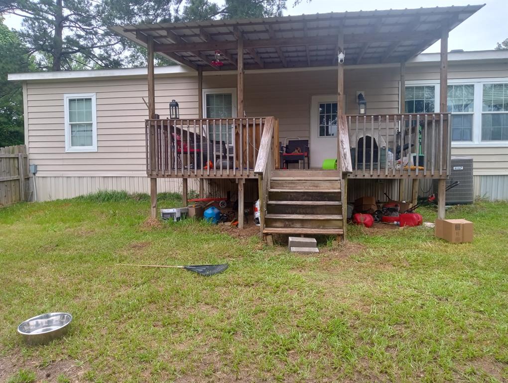 248 Timber Lane Mansfield, LA 71052 - Photo 12 of 12 a view of backyard with deck and outdoor seating