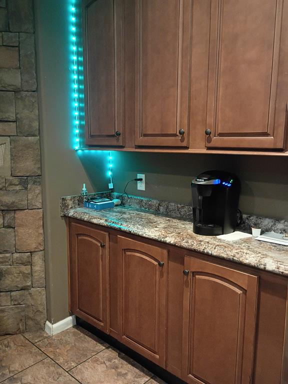 248 Timber Lane Mansfield, LA 71052 - Photo 3 of 12 a kitchen with granite countertop a sink and cabinets
