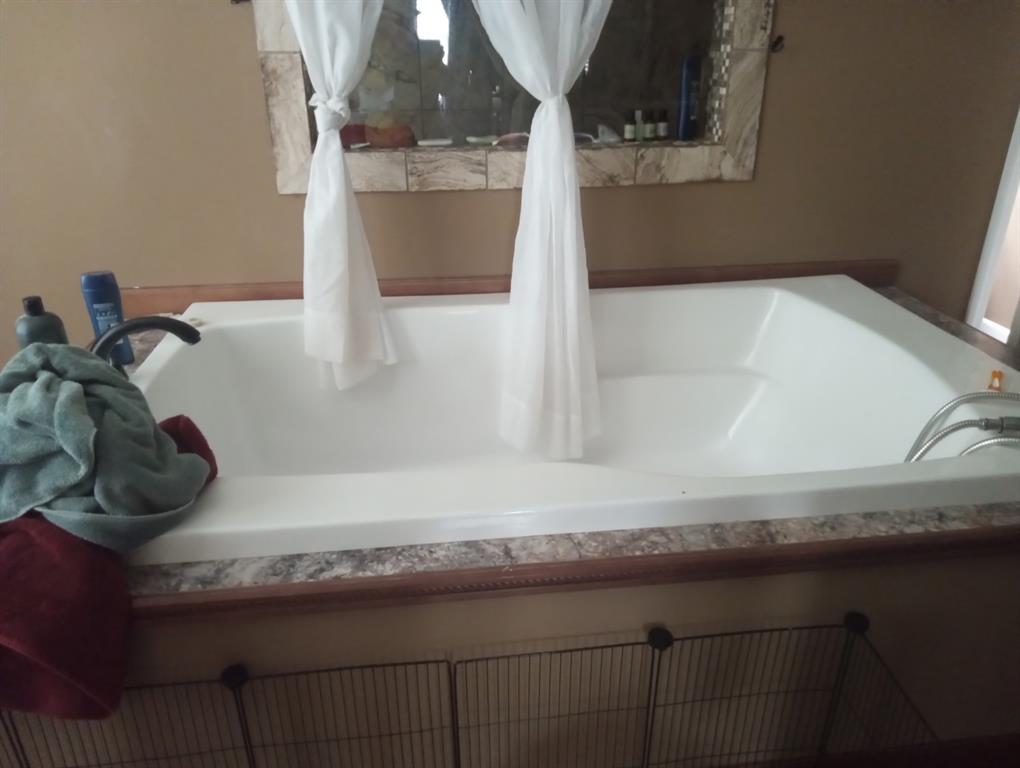 248 Timber Lane Mansfield, LA 71052 - Photo 8 of 12 a closeup of a sink and a mirror